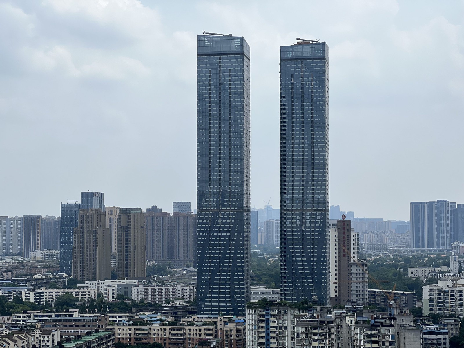 成都优化房产政策：5+2区外不限购、取消限价...